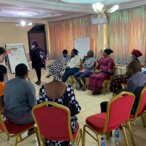 A photo of a group workshop on the topic of gender in development, organised by Aide et Action