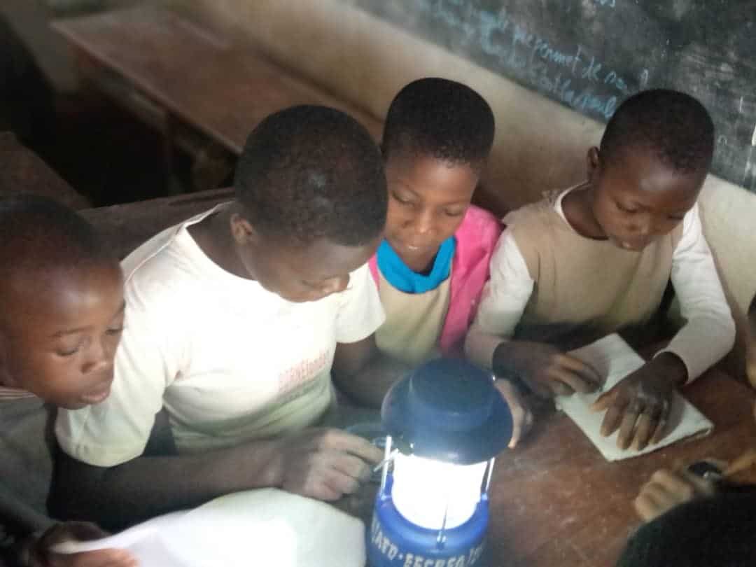 Pupils studying thanks to the solar lamp