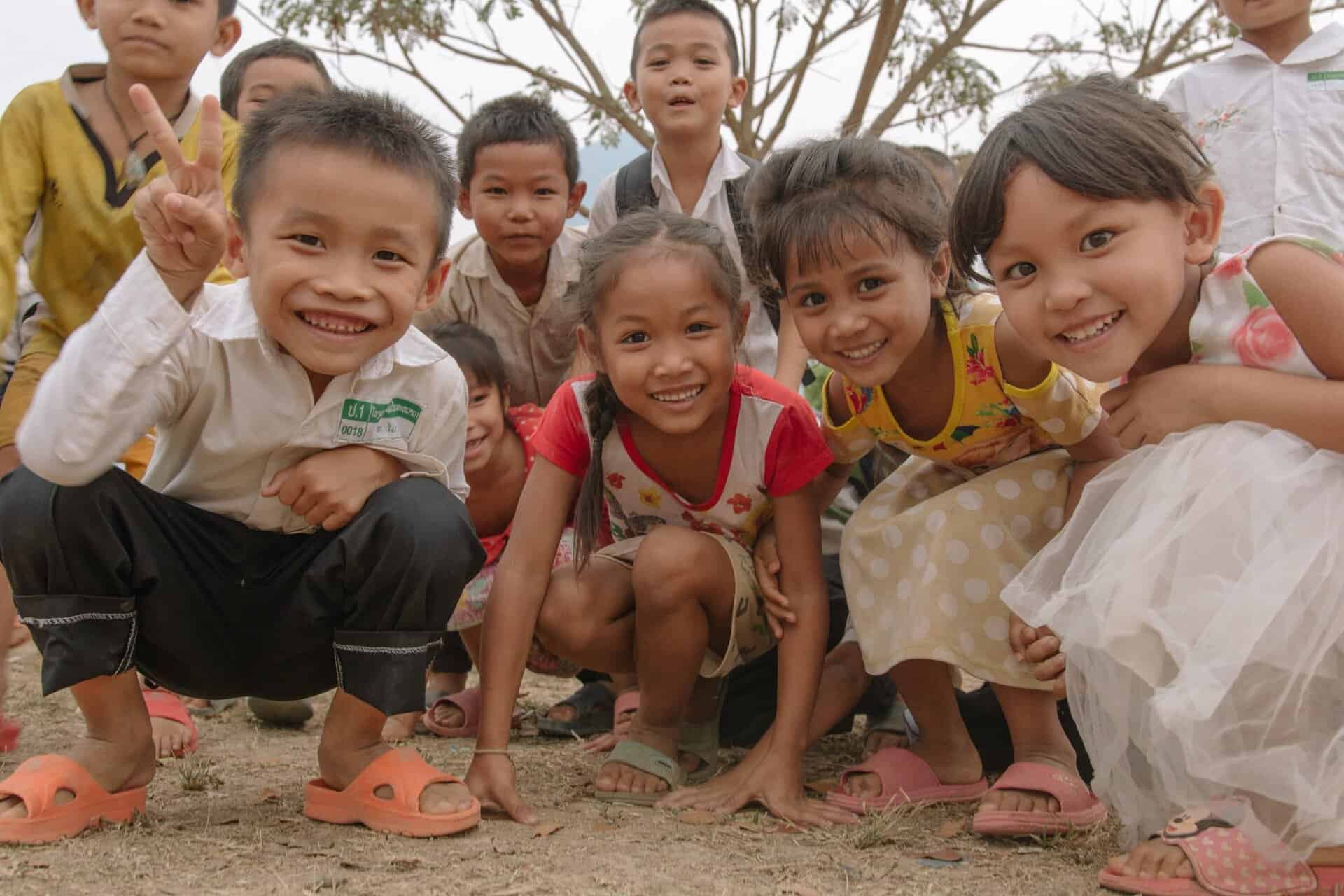 Laos Schoolchildren's group Copyright Vincent REYNAUD LACROZE scaled