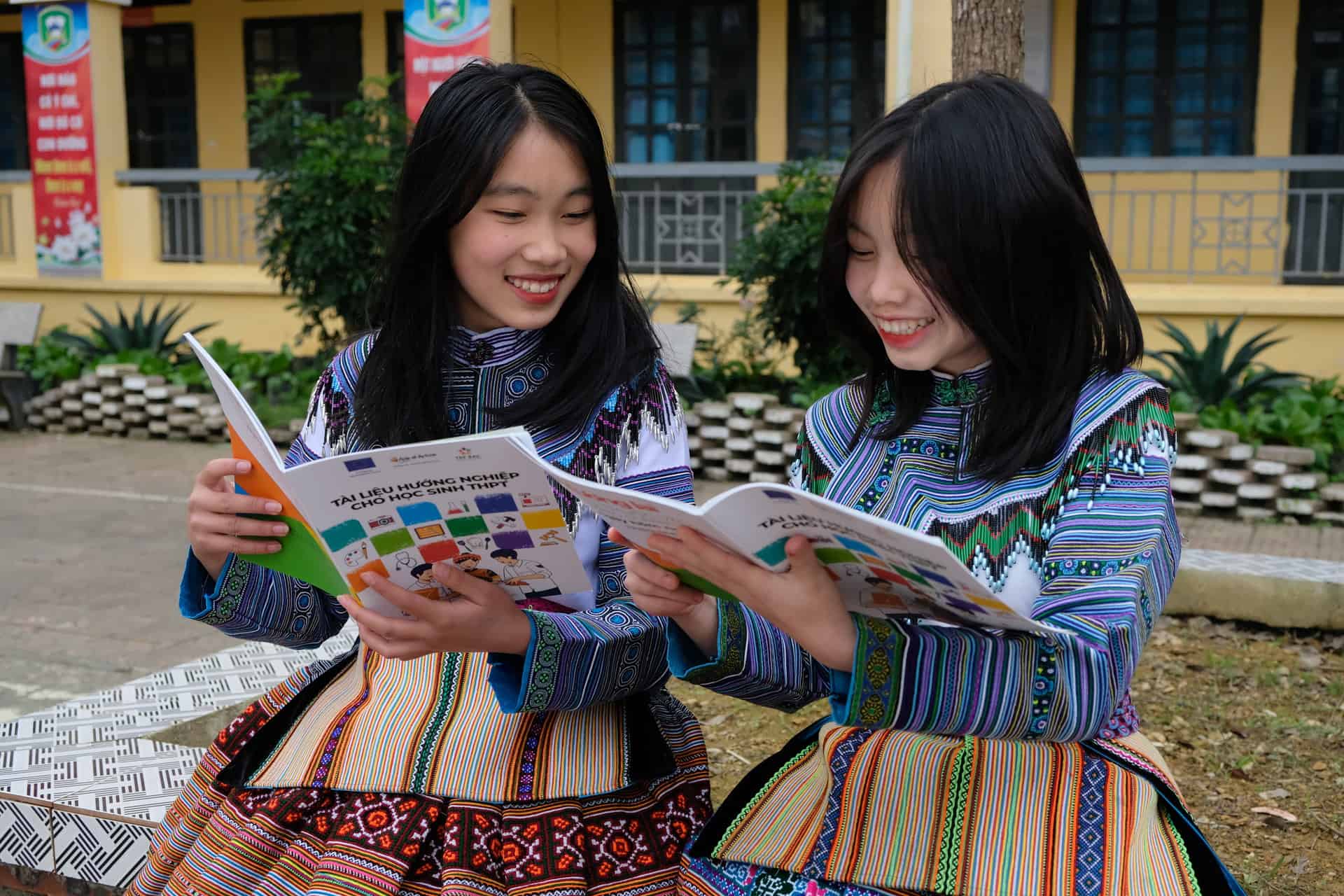 Two young girls study. Vietnam, December 2022. Anh Tran