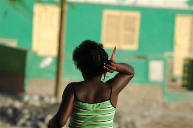 young girl with her back to celebrate World Menstrual Hygiene Day